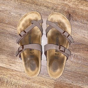 Womens Birkenstock strap sandals.